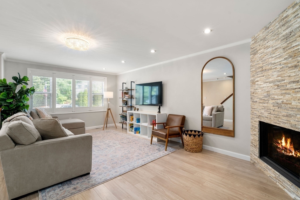 149 Bolivar Street, Unit C6 Canton, MA 02021 - Photo 1 of 41 a living room with furniture and a fireplace
