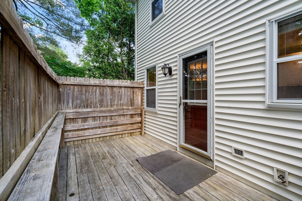 149 Bolivar Street, Unit C6 Canton, MA 02021 - Photo 11 of 41 a view of a wooden deck
