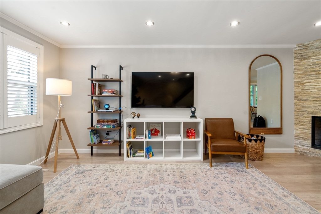 149 Bolivar Street, Unit C6 Canton, MA 02021 - Photo 17 of 41 a living room with furniture and a flat screen tv