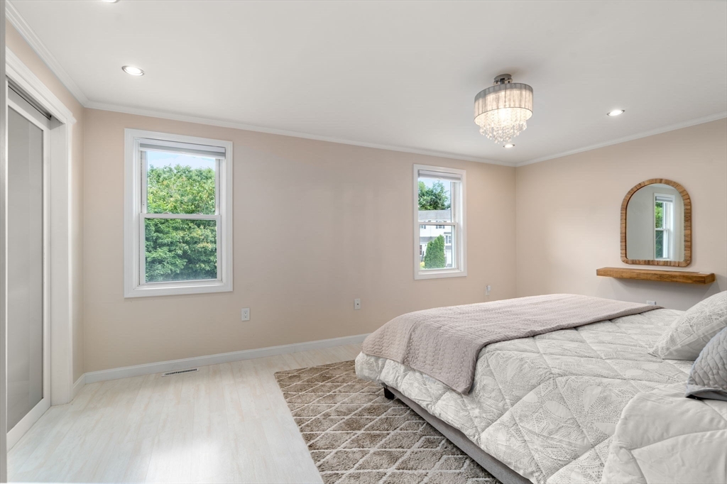 149 Bolivar Street, Unit C6 Canton, MA 02021 - Photo 25 of 41 a bedroom with a large bed and a window