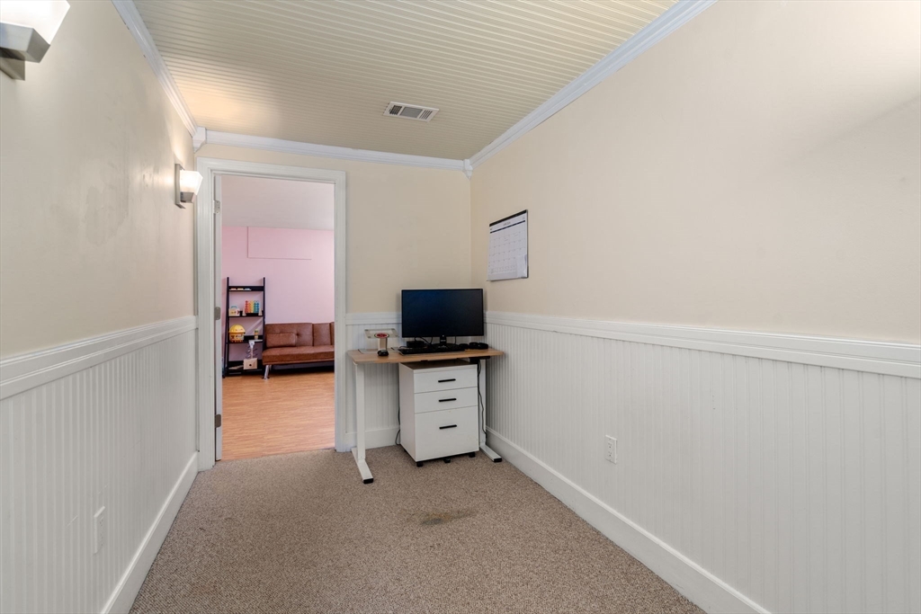 149 Bolivar Street, Unit C6 Canton, MA 02021 - Photo 32 of 41 a living room with furniture and flat screen tv