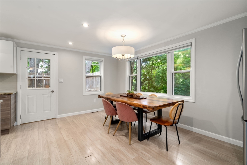 149 Bolivar Street, Unit C6 Canton, MA 02021 - Photo 5 of 41 a view of a dining room with furniture window and outside view