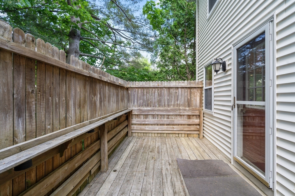149 Bolivar Street, Unit C6 Canton, MA 02021 - Photo 9 of 41 a view of balcony with wooden floor and outdoor seating
