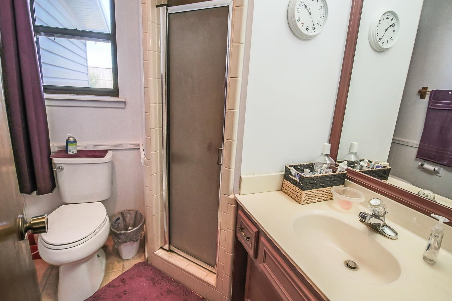 1609 Ave I Ralls, TX 79357 - Photo 16 of 32 a bathroom with a toilet sink and mirror