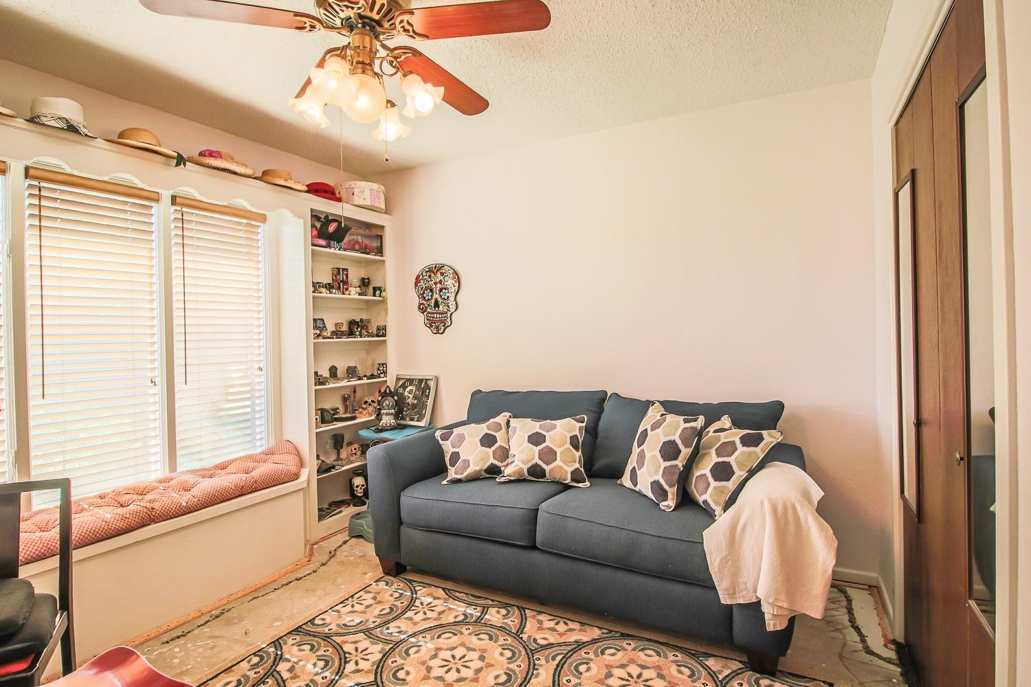 1609 Ave I Ralls, TX 79357 - Photo 18 of 32 a living room with furniture and a large window