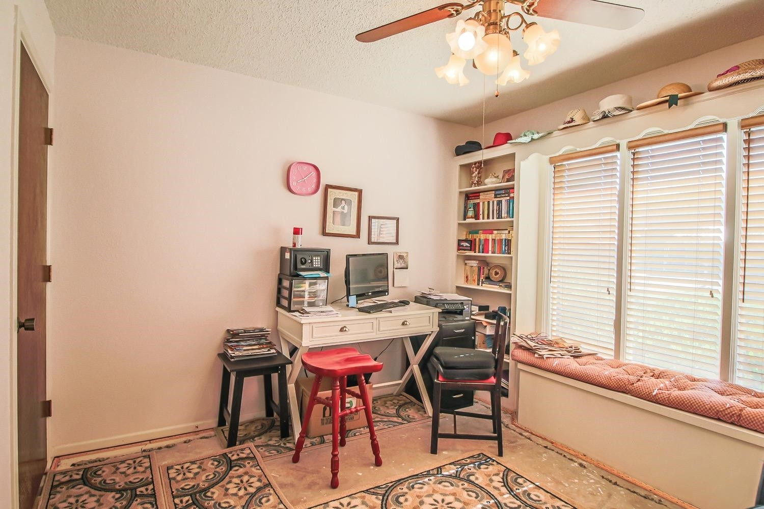 1609 Ave I Ralls, TX 79357 - Photo 19 of 32 a view of a workspace with furniture and a window