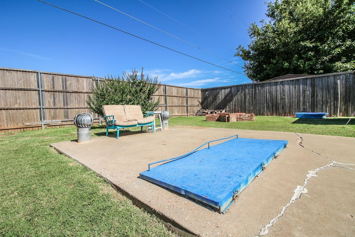 1609 Ave I Ralls, TX 79357 - Photo 32 of 32 a view of a backyard with sitting area