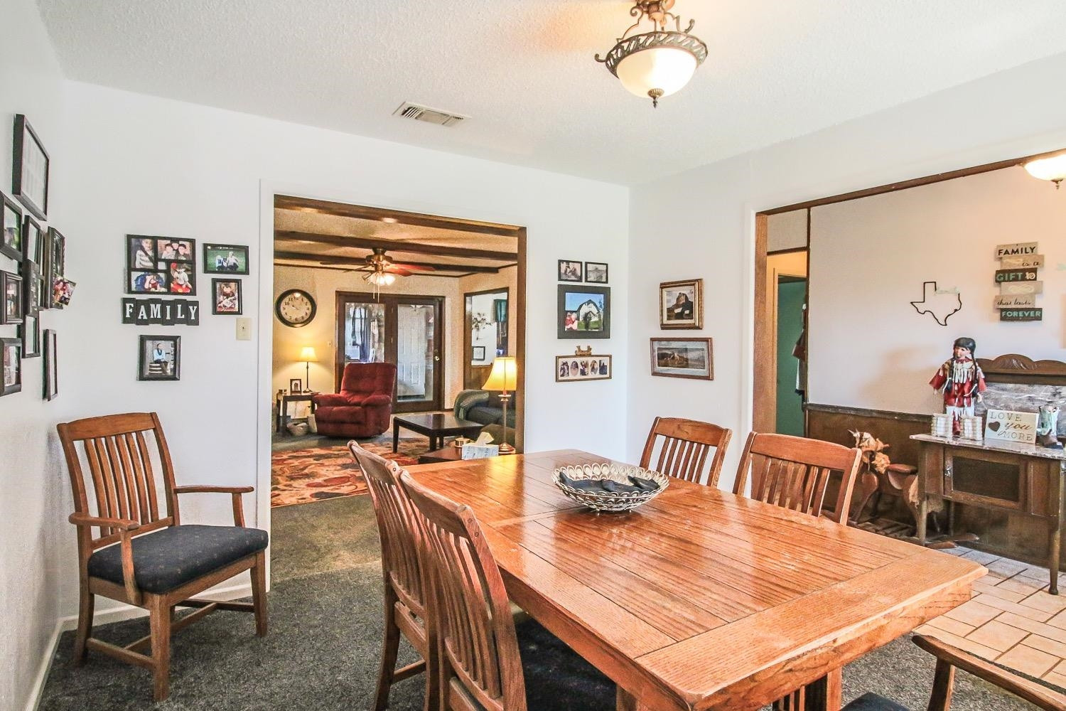1609 Ave I Ralls, TX 79357 - Photo 6 of 32 a view of a dining room with furniture window and outside view