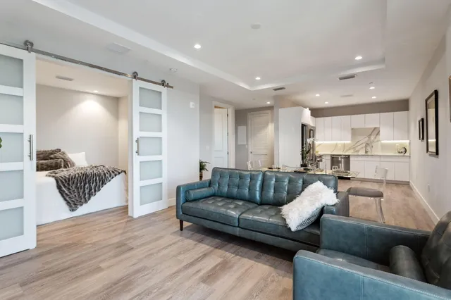 a living room with furniture and a couch