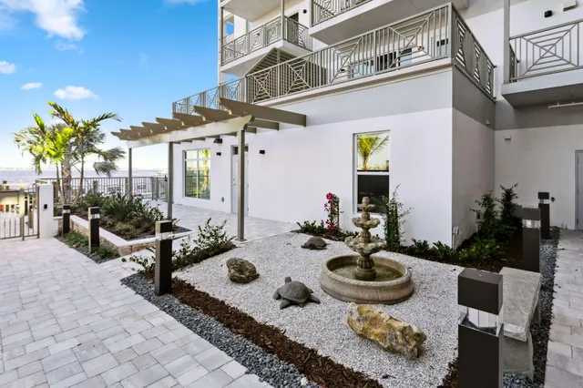 a view of a swimming pool with a lounge chair