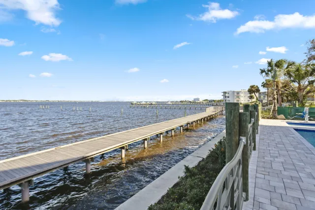 a view of balcony and floor with wooden floor