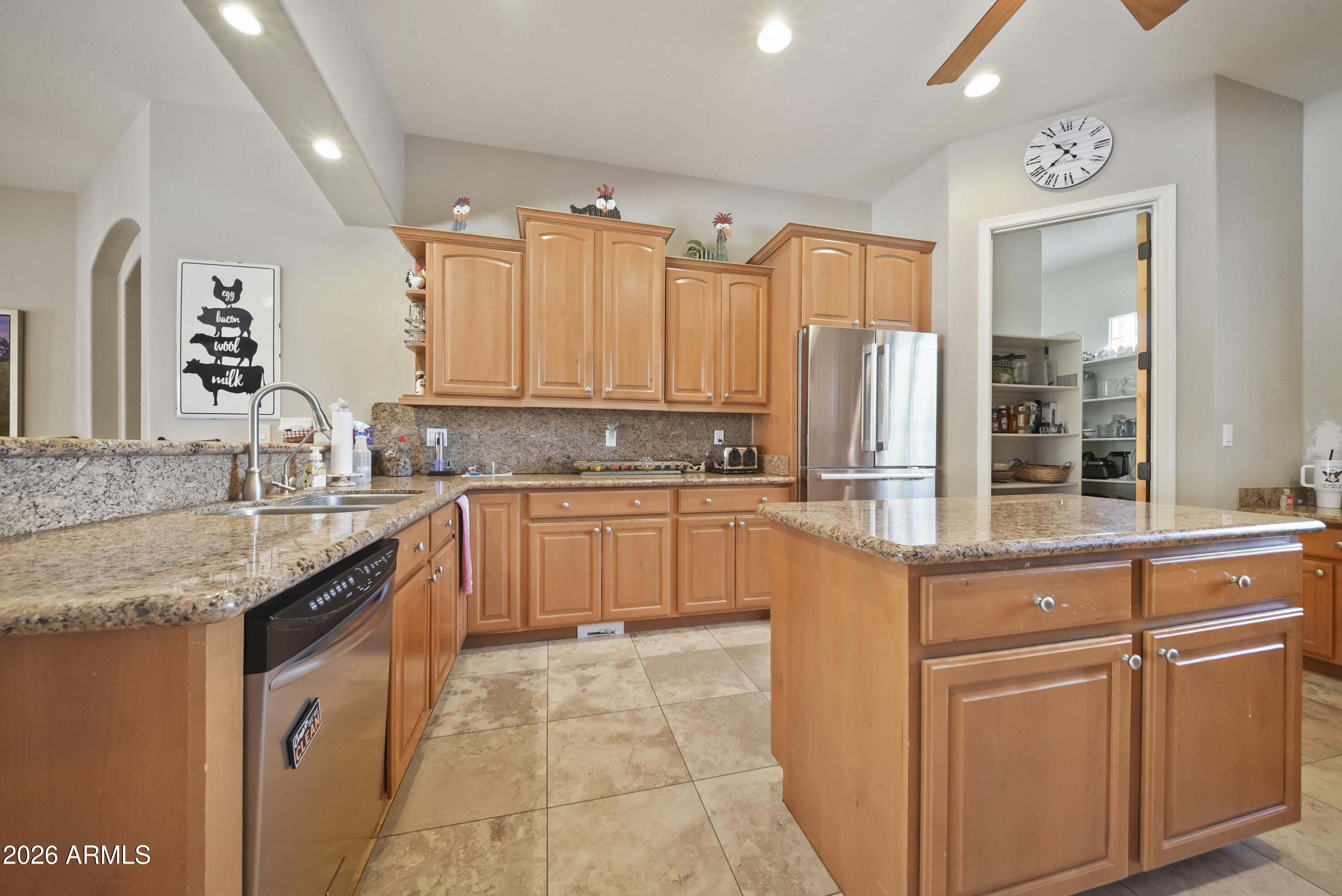 605 West Ridgecrest Road Phoenix, AZ 85086 - Photo 19 of 40 a kitchen with granite countertop a sink stainless steel appliances and cabinets
