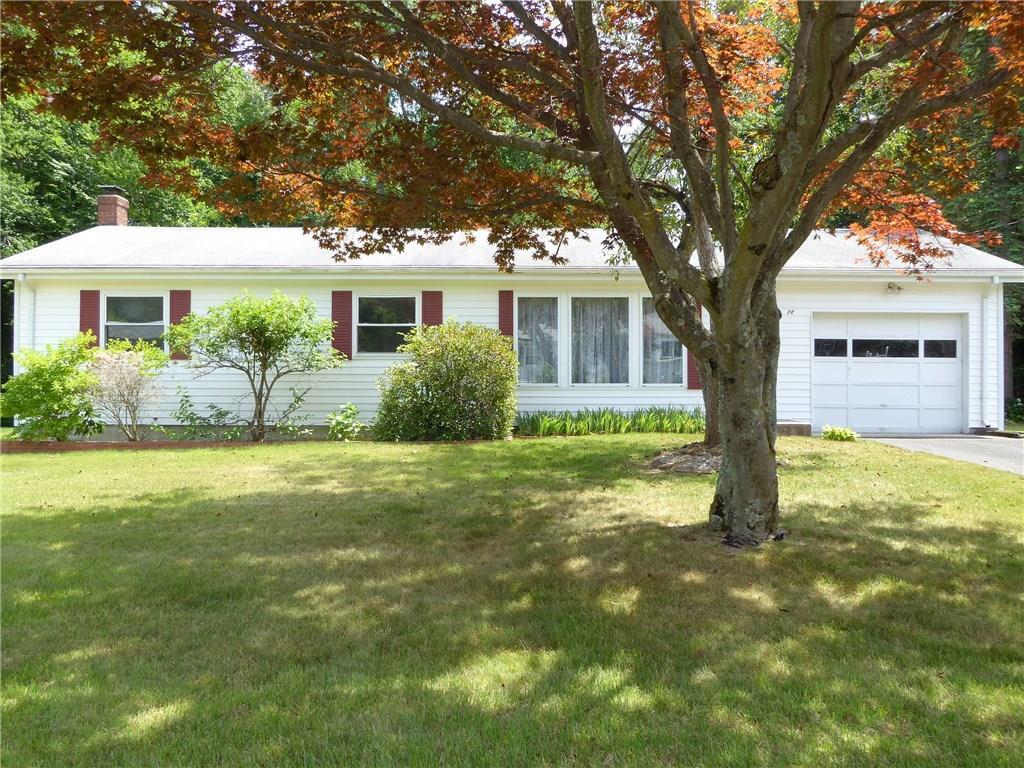 a house view with a garden space