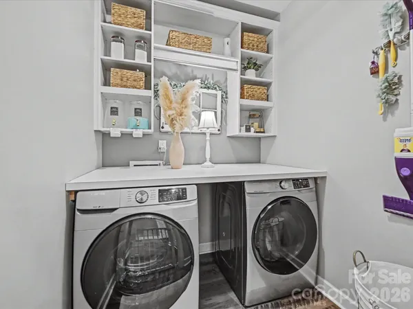 a utility room with dryer and washer