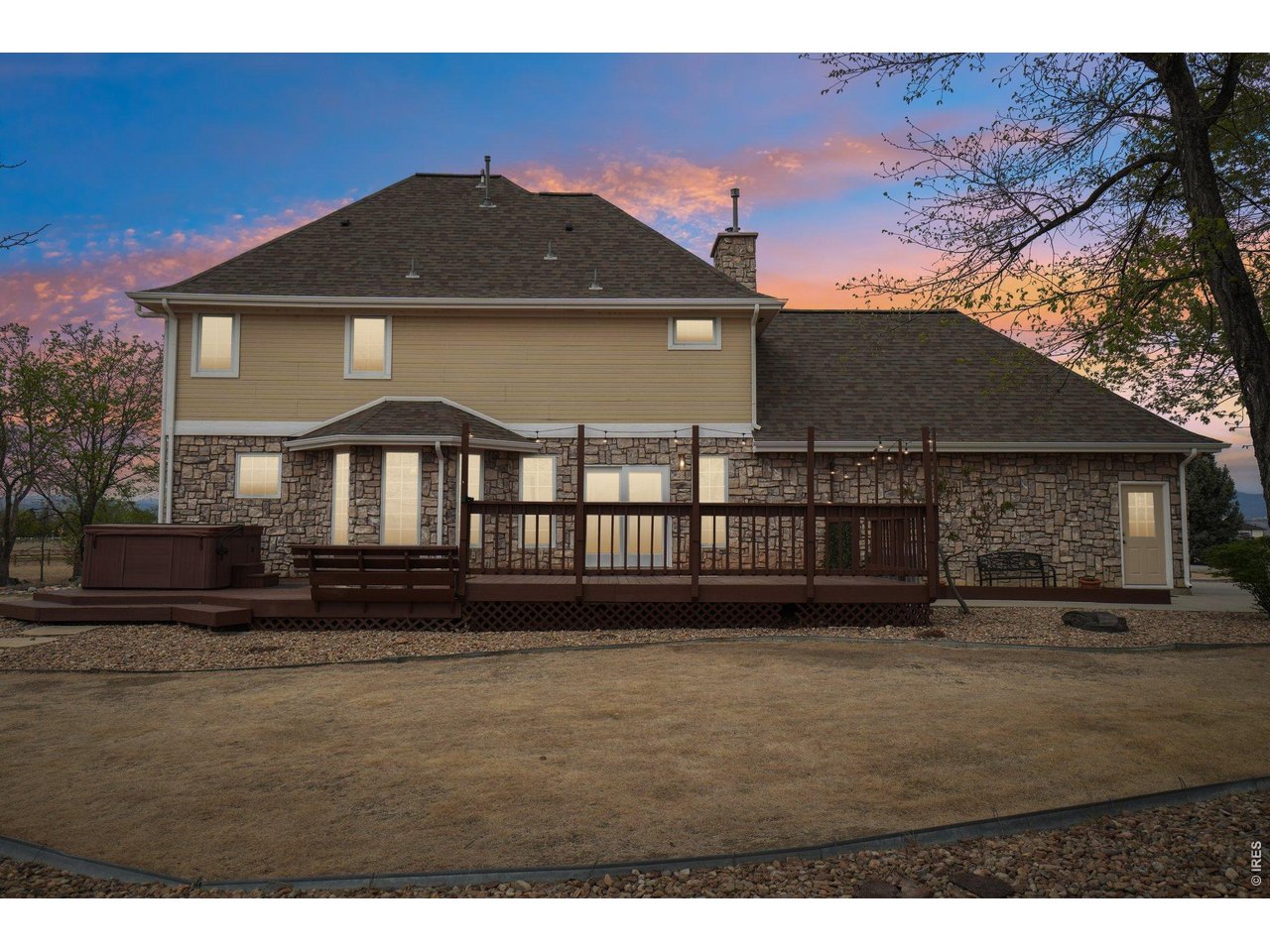 9743 Yellowstone Road Longmont, CO 80504 - Photo 48 of 50 The expansive back deck offers room for relaxation and entertaining
