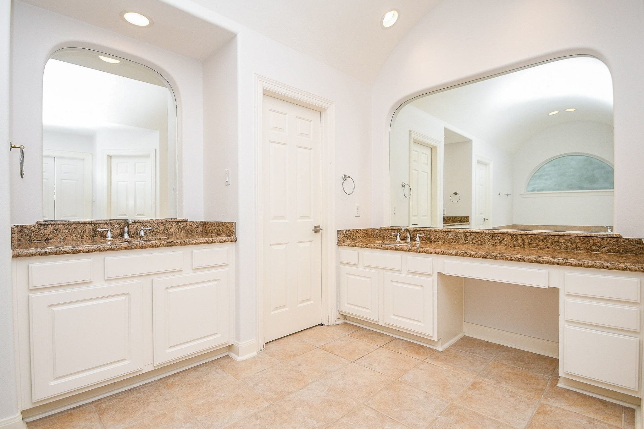 2826 Tudor Manor Houston, TX 77082 - Photo 21 of 37 Primary bathroom features separate his and her sinks, a dedicated vanity area, and large vanity mirrors.