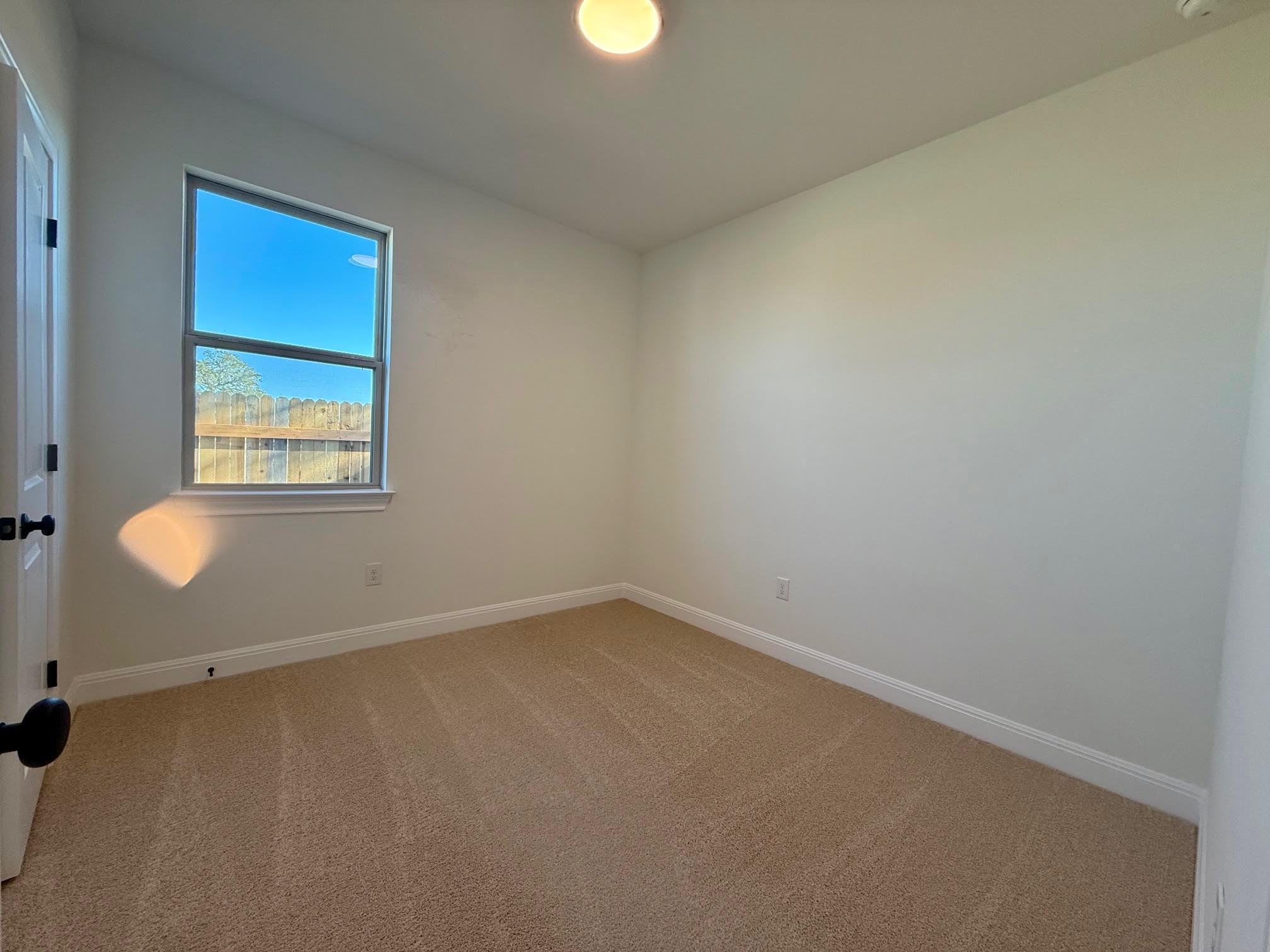 332 Glocken Lane Kyle, TX 78640 - Photo 20 of 27 an empty room with a window