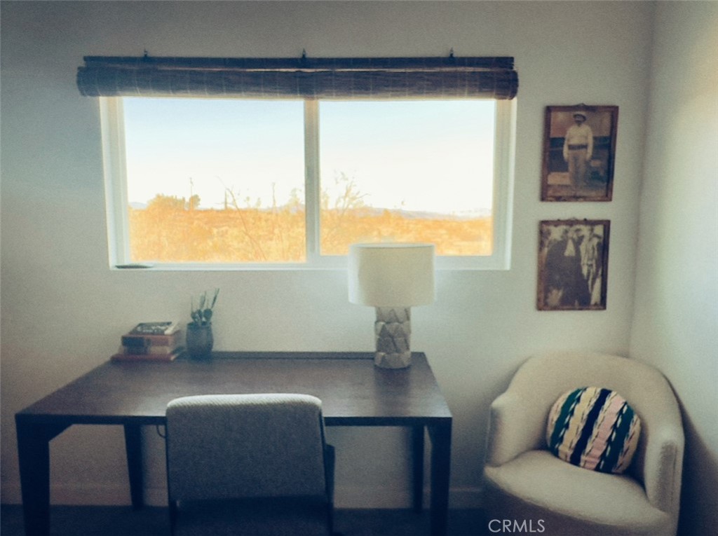 1212 Acoma Trail Landers, CA 92285 - Photo 11 of 23 a living room with furniture and a window