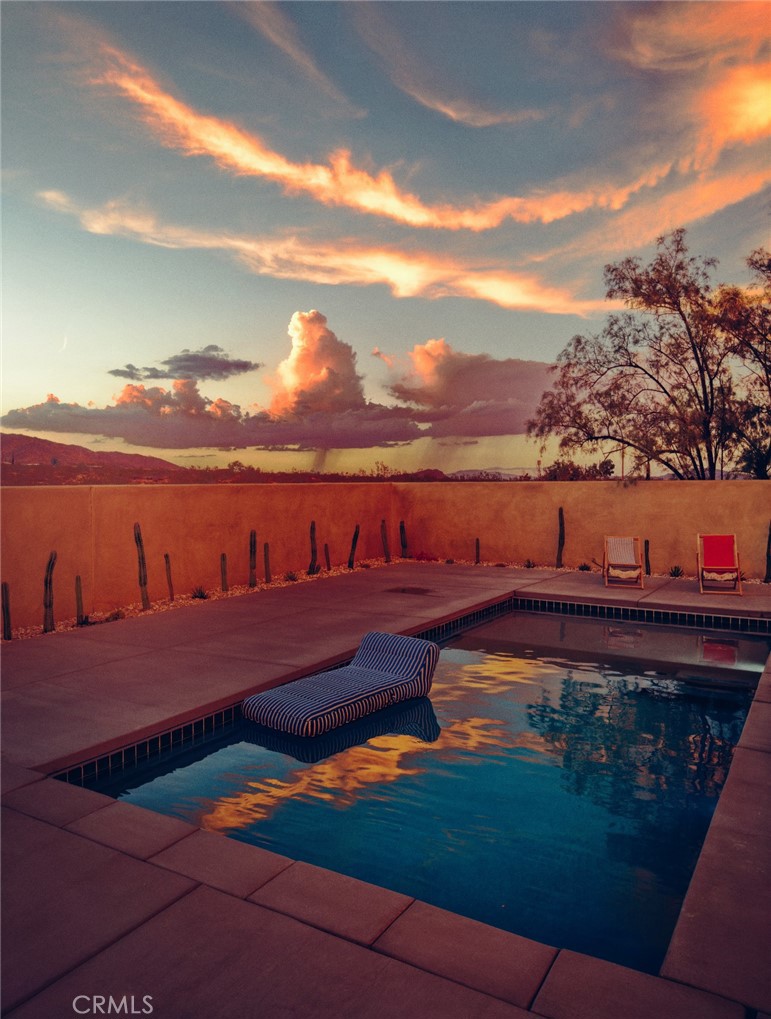 1212 Acoma Trail Landers, CA 92285 - Photo 19 of 23 a view of a lake with outdoor space