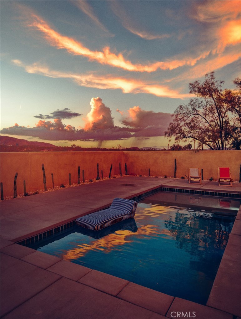 1212 Acoma Trail Landers, CA 92285 - Photo 3 of 23 a view of a lake with outdoor space