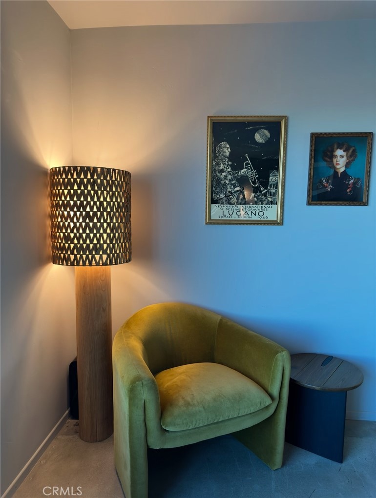 1212 Acoma Trail Landers, CA 92285 - Photo 9 of 23 a blue chair sitting next to a small yard