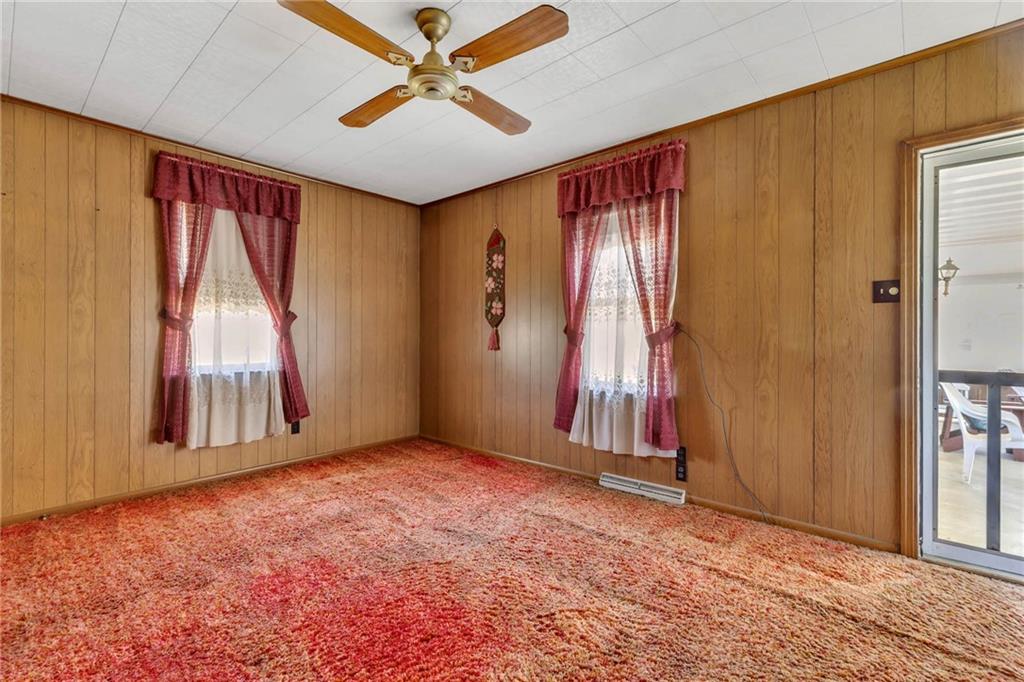 421 Friel Road Baden, PA 15005 - Photo 8 of 23 an empty room with windows and closet