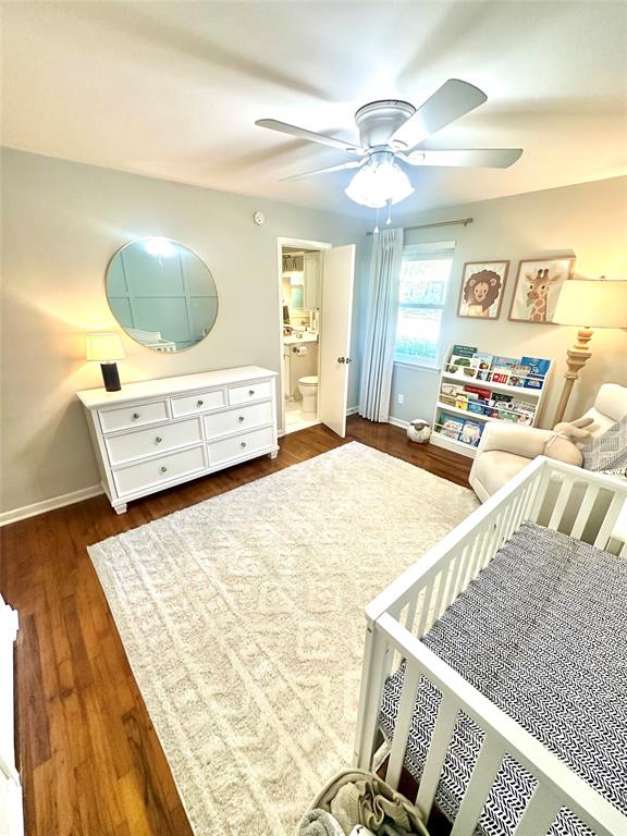 8415 Hunnicut Road Dallas, TX 75228 - Photo 12 of 17 a bedroom with a bed and a dresser