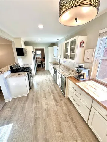 $484,000 | 8415 Hunnicut Road, Dallas, TX 75228