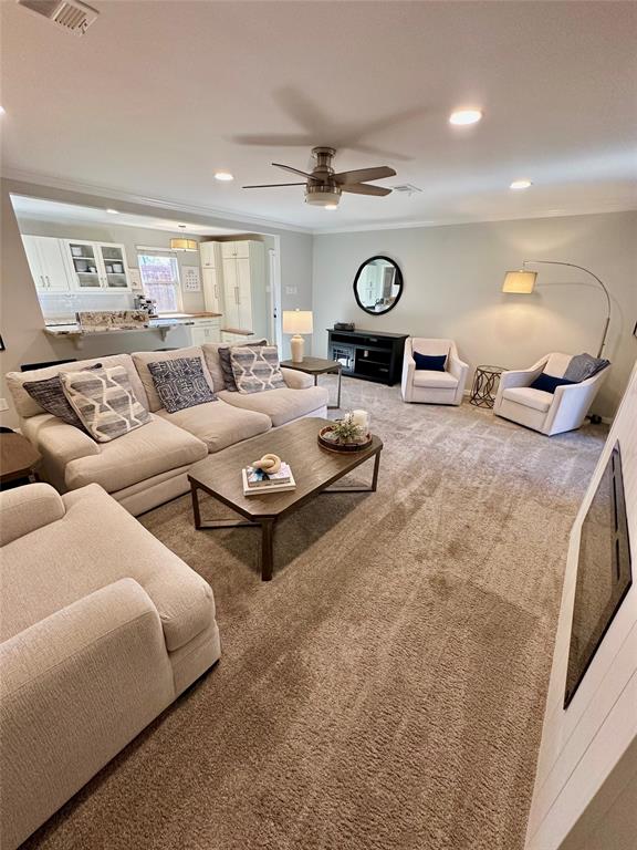8415 Hunnicut Road Dallas, TX 75228 - Photo 4 of 17 a living room with furniture and wooden floor