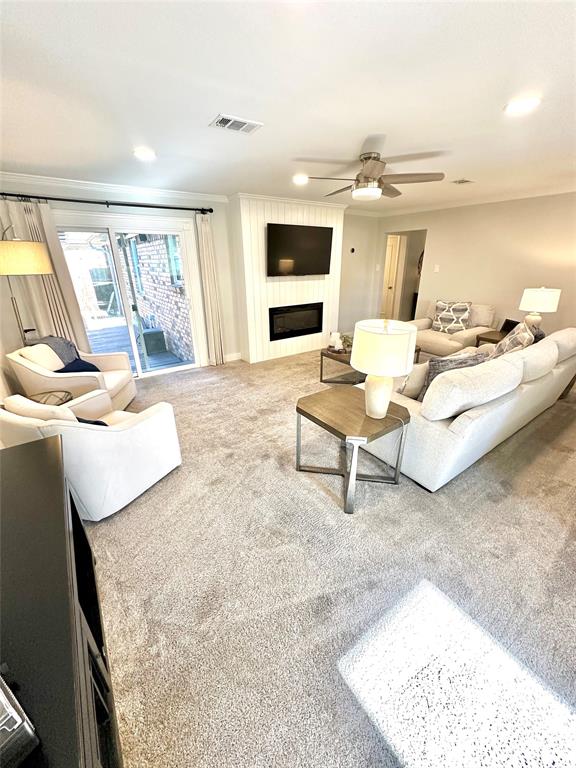 8415 Hunnicut Road Dallas, TX 75228 - Photo 5 of 17 a living room with furniture and a flat screen tv