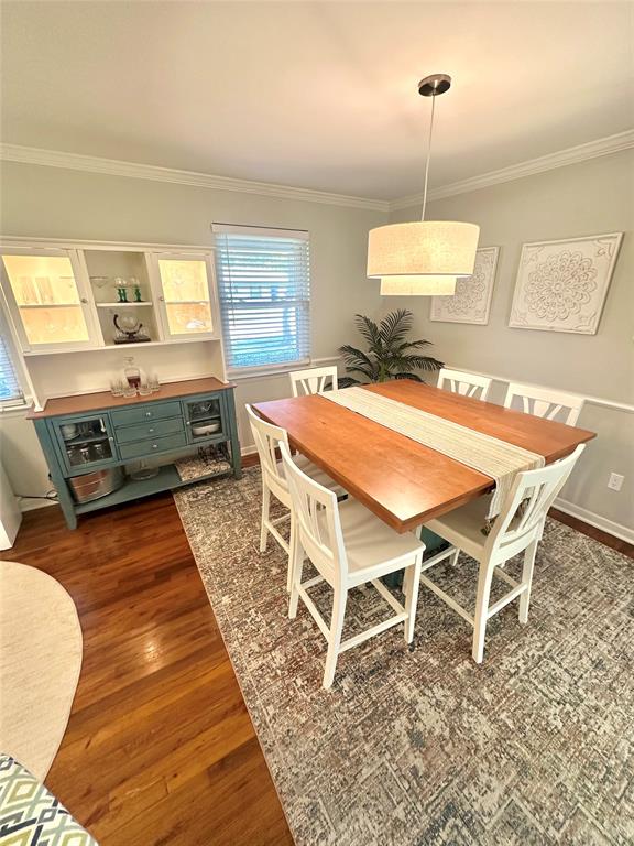 8415 Hunnicut Road Dallas, TX 75228 - Photo 7 of 17 a dining room with a table and chairs