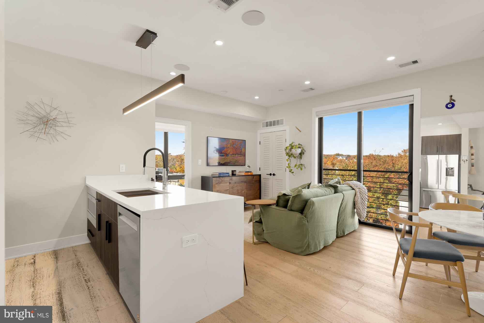 3933 14th Street Northwest, Unit 8 Washington, DC 20011 - Photo 2 of 28 a living room with furniture and a large window