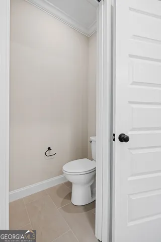 a bathroom with a toilet