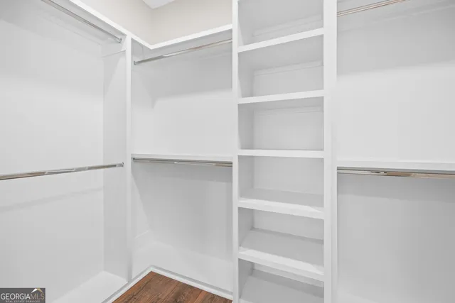 a view of an empty walk in closet