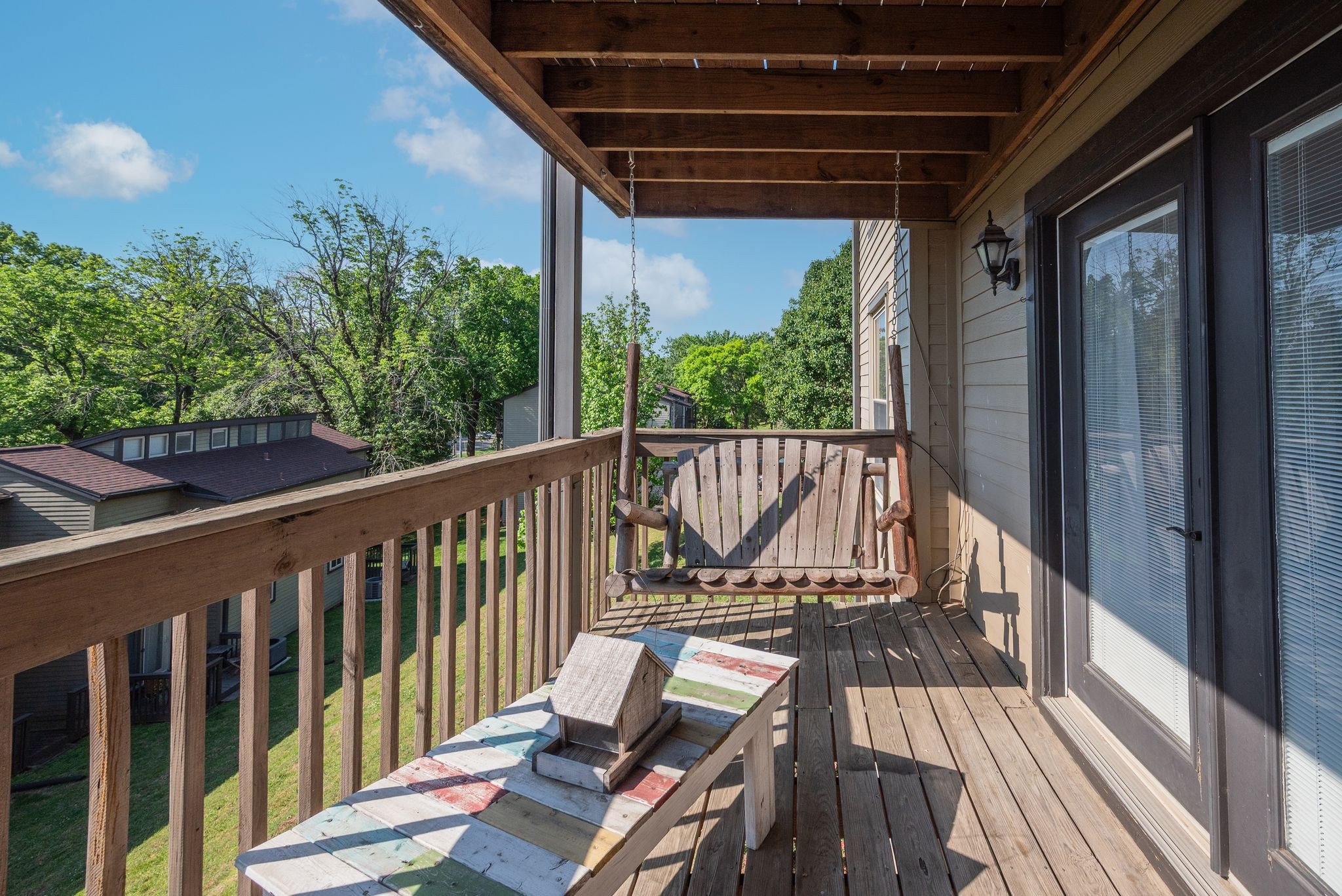 404 Summit Ridge Place Nashville, TN 37215 - Photo 12 of 19 a view of balcony with wooden floor and iron fence
