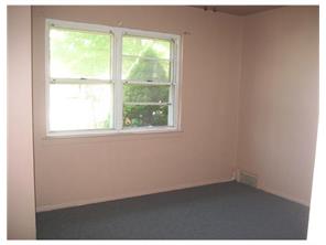 34 Idlewild Road Edison, NJ 08817 - Photo 1 of 7 an empty room with a window