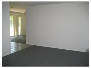 34 Idlewild Road Edison, NJ 08817 - Photo 6 of 7 an empty room with wooden floor and windows
