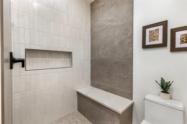 a bathroom with a bathtub sink and toilet