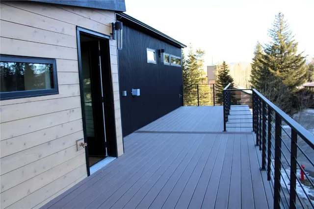 a balcony view with a hardwood