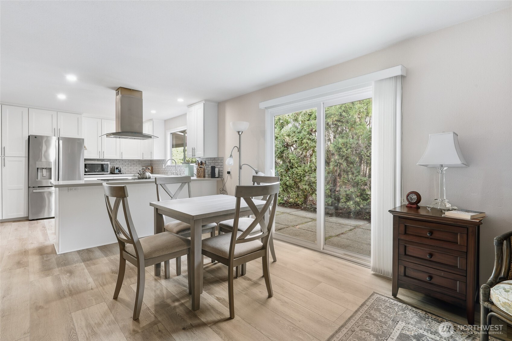 722 Wandering Creek Drive Bothell, WA 98021 - Photo 12 of 23 a view of a dining room with furniture window and outside view
