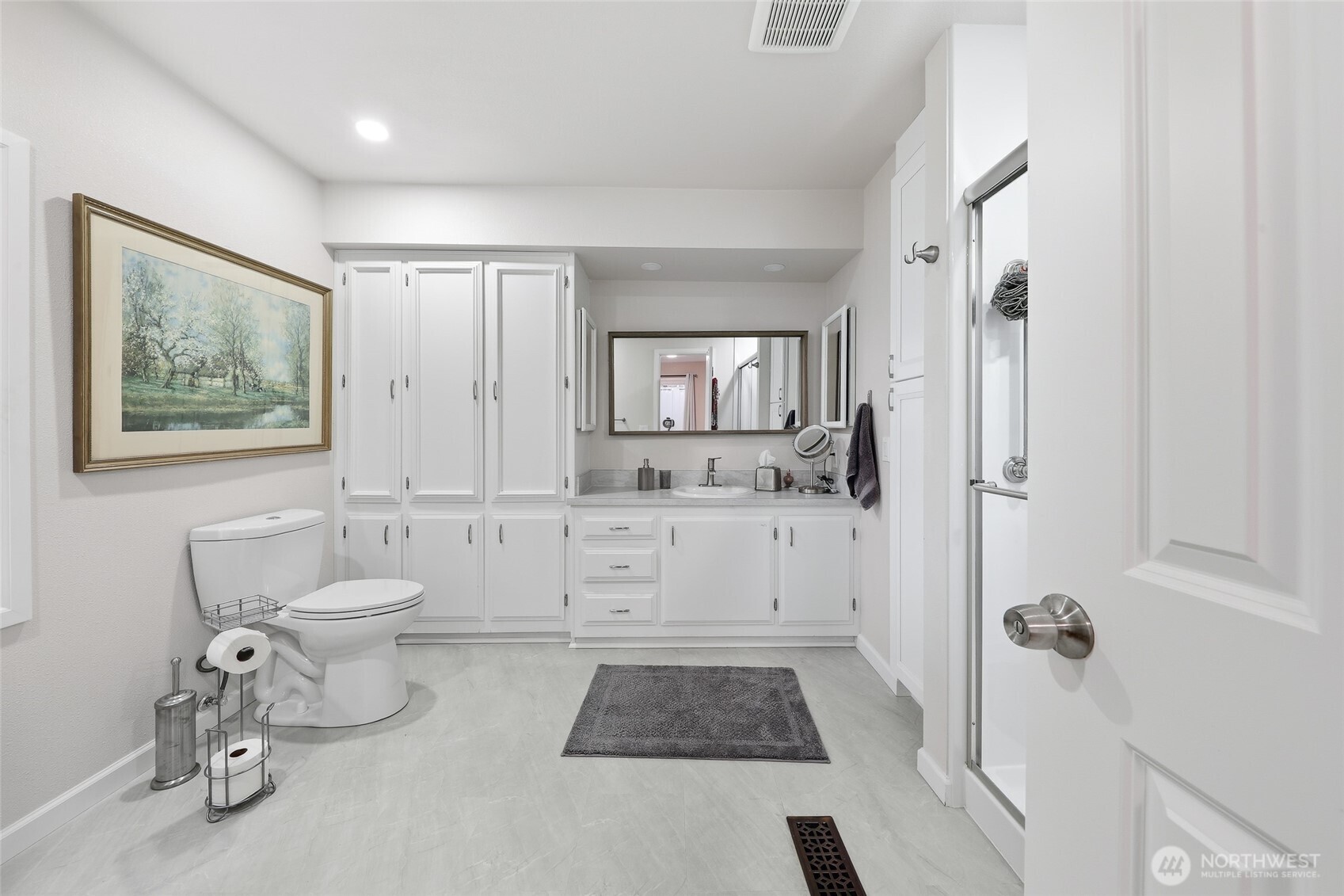 722 Wandering Creek Drive Bothell, WA 98021 - Photo 16 of 23 a bathroom with a granite countertop sink a toilet and shower