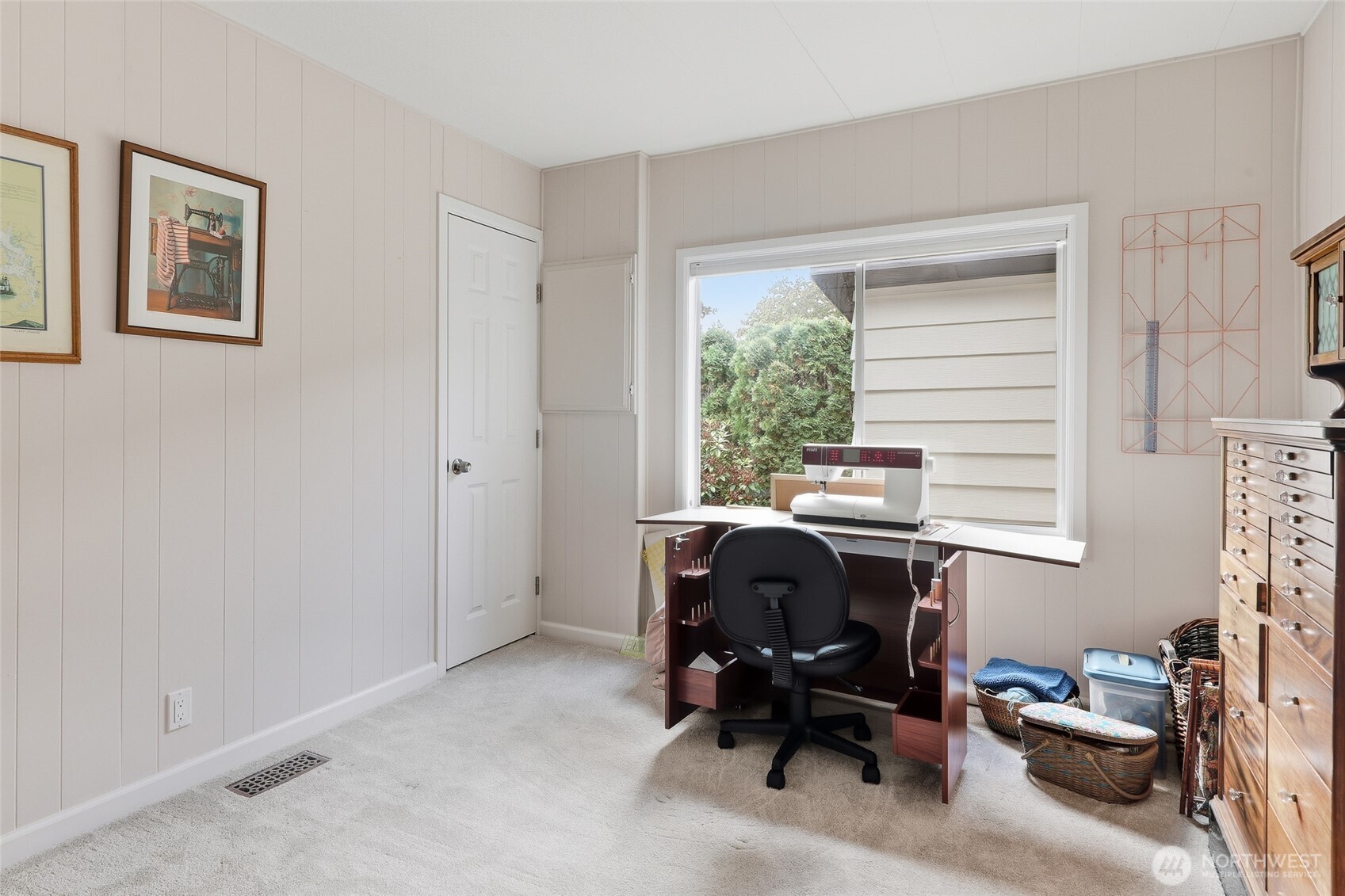 722 Wandering Creek Drive Bothell, WA 98021 - Photo 18 of 23 a view of workspace with wooden floor and windows