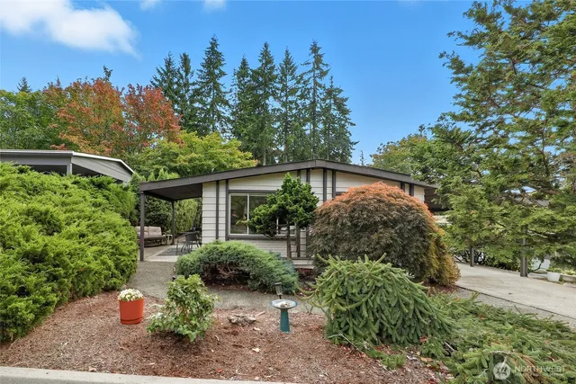 a backyard of a house with a garden