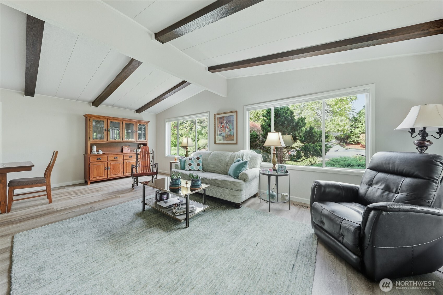 722 Wandering Creek Drive Bothell, WA 98021 - Photo 7 of 23 a living room with furniture and a large window