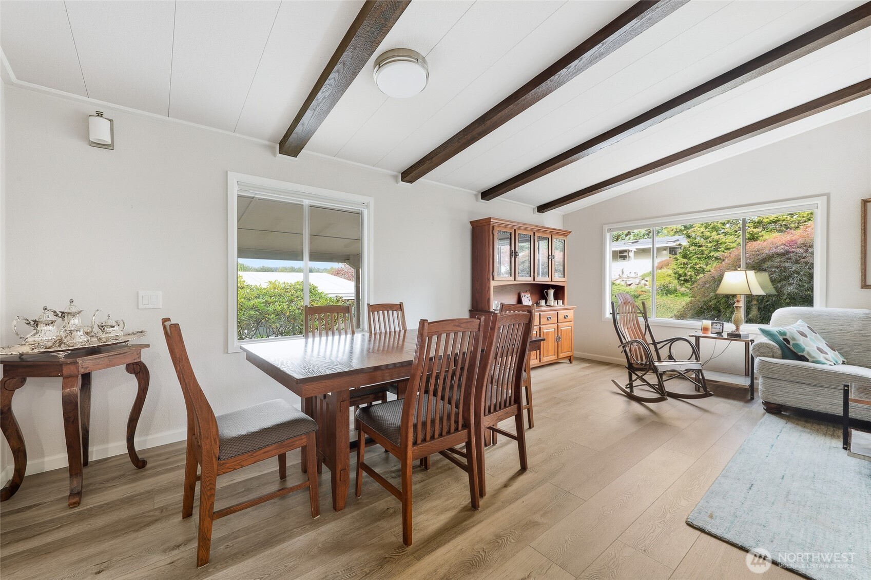 722 Wandering Creek Drive Bothell, WA 98021 - Photo 10 of 23 a dining room with furniture window and outside view