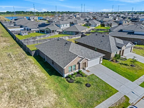 an aerial view of a house with a garden
