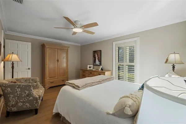 a view of a swimming pool with outdoor seating