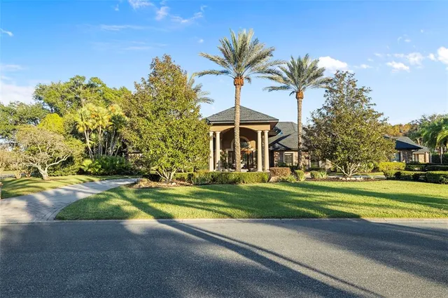 a view of a patio with swimming pool table and chairs