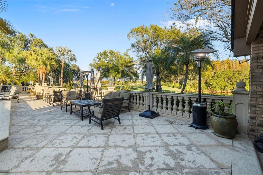 18707 Pepper Pike Lutz, FL 33558 - Photo 45 of 76 a view of a chairs and tables in the patio