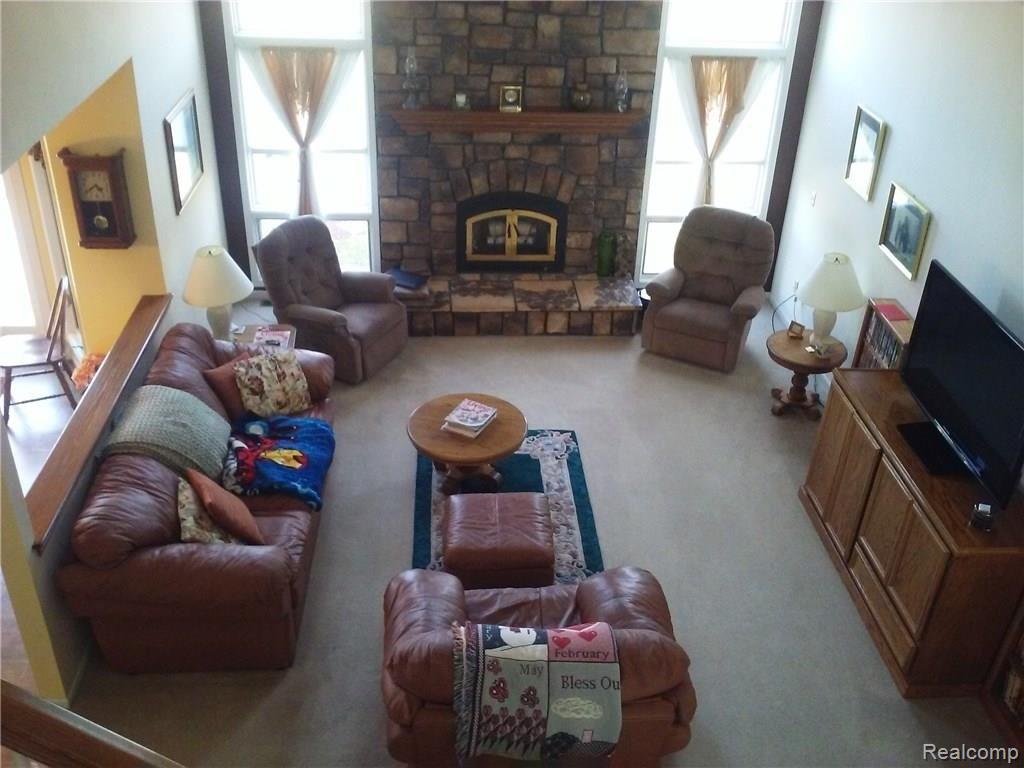4660 Capac Road Capac, MI 48014 - Photo 9 of 65 This is a view of the great room from the loft area.